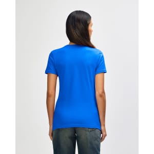A blue ladies' t-shirt with a fitted design and a subtle brand logo on the back, paired with denim jeans.
