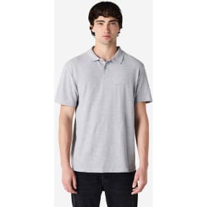 A grey Gildan Softstyle Adult Double Pique Polo, featuring a collar and short sleeves, with a logo.