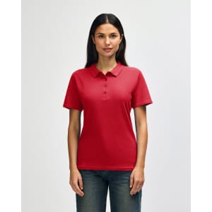 A red ladies' polo shirt with a collar and buttons, displayed on a model against a plain background.