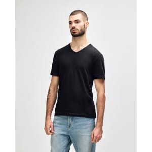 A black Gildan Softstyle adult V-neck T-shirt displayed on a male model, featuring a logo.