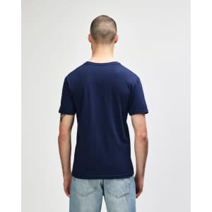 A navy Gildan Softstyle adult V-neck T-shirt, viewed from the back, featuring a simple design with minimal detailing.