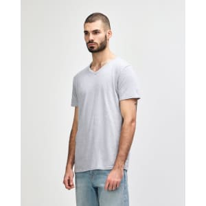 A grey Gildan Softstyle adult v-neck t-shirt displayed on a male model, featuring a logo on the shirt.