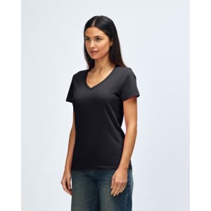 A black Gildan Softstyle ladies' V-neck T-shirt displayed on a model, paired with blue jeans.