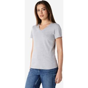 A grey ladies' V-neck T-shirt with short sleeves, featuring a subtle logo on the design.
