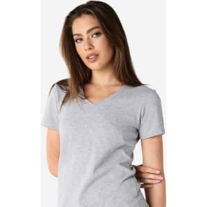 A grey Gildan Softstyle ladies' V-neck t-shirt with a fitted design and short sleeves.