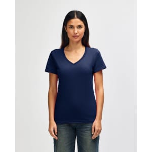 A navy Gildan Softstyle ladies' V-neck T-shirt displayed on a model, featuring a simple design and branding.