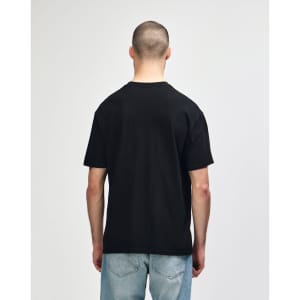 A black Gildan Softstyle adult midweight T-shirt displayed from the back, featuring a simple design and a logo.