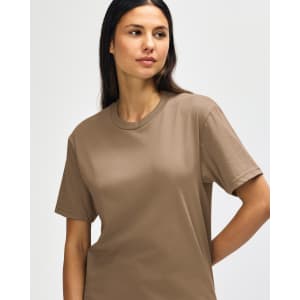A plain brown Gildan Softstyle adult midweight T-shirt, featuring a logo on the sleeve.