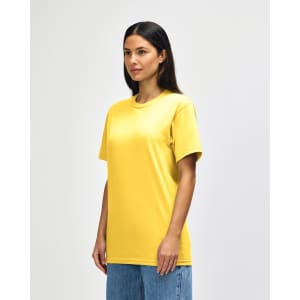 A yellow and blue Gildan Softstyle Adult Midweight T-Shirt displayed on a model. The shirt has a logo.