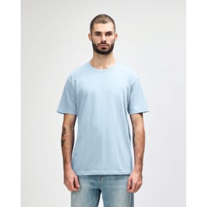 A light blue midweight T-shirt on a male model, featuring a crew neck and short sleeves. It includes a logo on the side.