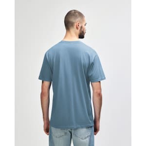 A softstyle adult midweight t-shirt in blue with yellow side panels, featuring a logo on the back.