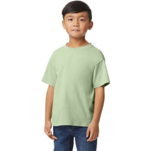 A midweight youth T-shirt in soft sage green, featuring a simple design and a branding logo.