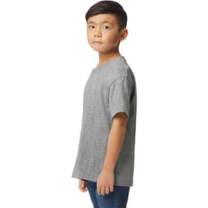 A grey Gildan Softstyle youth midweight T-shirt shown from the back on a boy, featuring short sleeves.