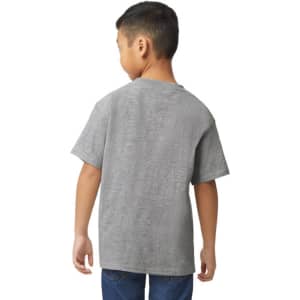 A youth midweight T-shirt in grey, featuring short sleeves and a relaxed fit. The model stands with hands in pockets.