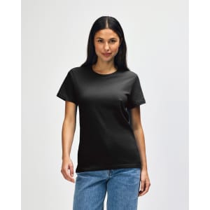A black Gildan Softstyle ladies midweight t-shirt displayed on a model, featuring a simple design and a logo.