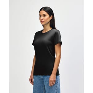 A black midweight t-shirt for ladies, featuring a classic fit and short sleeves. The model is wearing it with jeans.
