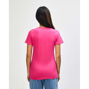 A pink Gildan Softstyle ladies midweight t-shirt viewed from the back, with a fitted design.