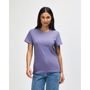 A purple Gildan Softstyle ladies midweight T-shirt displayed on a model, featuring a simple design without text.