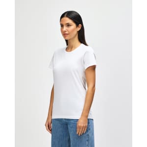 A white midweight ladies t-shirt displayed on a model, featuring short sleeves and a casual fit.