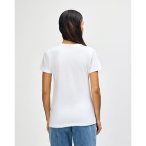 A white Gildan Softstyle ladies midweight T-shirt shown from the back, featuring a simple design and casual fit.