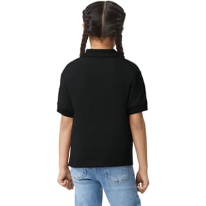 A youth polo shirt in black, featuring a branded logo, viewed from the back on a child.