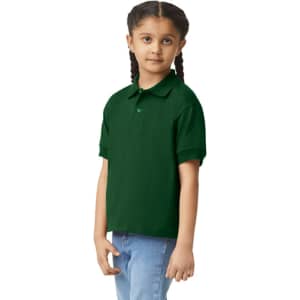 A green youth polo shirt displayed on a model with braided hair, featuring a collar and short sleeves.