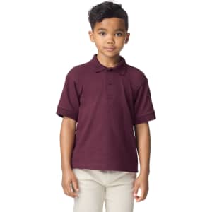 A burgundy Gildan Youth Polo shirt with a collar and short sleeves, featuring a logo on the chest area.