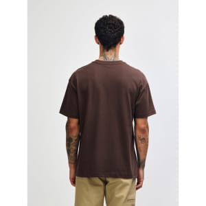 A brown t-shirt with short sleeves, viewed from the back, featuring a logo.