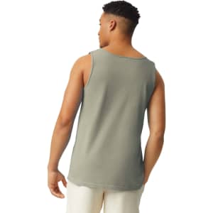 A man wearing a grey adult tank top, showcasing a simple, casual design with no visible logos.