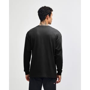 A black American Apparel Super Heavyweight T-shirt displayed from the back, featuring a simple design.