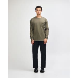 An olive green heavyweight long-sleeve t-shirt with a chest pocket, paired with matching olive green trousers.