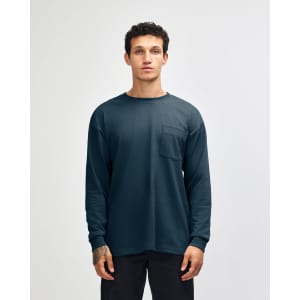 A dark blue long-sleeve t-shirt with a pocket, featuring a simple design and a logo.