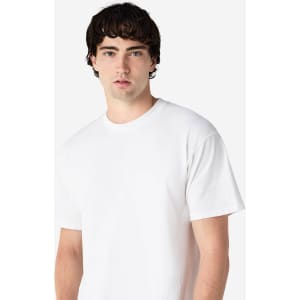A white Gildan Hammer Adult T-Shirt displayed on a model, featuring a standard crew neck and short sleeves.