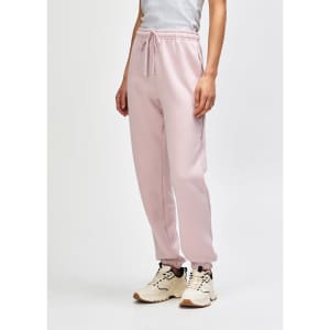Unisex sweatpants in soft pink, featuring a snug fit and side pockets. Includes a visible logo detail.