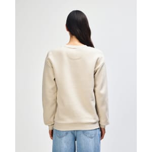 A unisex crewneck sweatshirt in a light beige colour, featuring a logo on the back and ribbed cuffs.