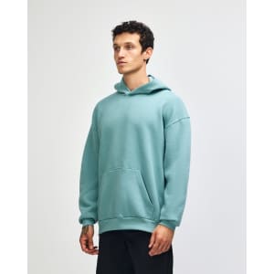 A unisex hooded sweatshirt in a soft green shade, featuring a front pouch pocket and a branded logo.