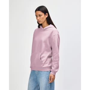 A unisex hooded sweatshirt in a soft pink colour, featuring a front pocket and a hood. It has a logo.