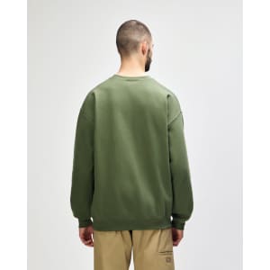A green Gildan Softstyle adult sweatshirt is displayed from the back, featuring a simple design.