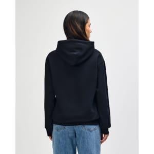 A black hooded sweatshirt with a relaxed fit, featuring a hood and a kangaroo pocket. It has a logo on the back.