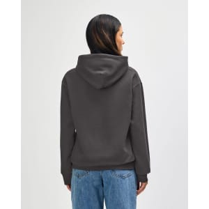 A hooded sweatshirt in a muted olive green, featuring a logo and set against a plain background.