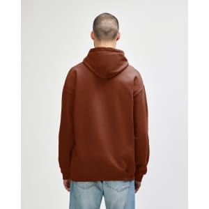 A brown hooded sweatshirt featuring a spacious hood and a relaxed fit, with an unseen logo on the back.