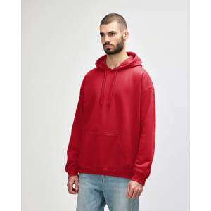 A red hooded sweatshirt displayed on a model, featuring a front pocket and a drawstring hood. It has a logo.