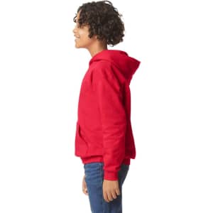 A red youth hooded sweatshirt with a kangaroo pocket, shown from the side on a person with curly hair.