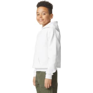 A youth in a white hooded sweatshirt smiles, showcasing the side view of the garment. It features a logo.