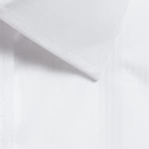 A close-up of a white shirt collar featuring a sleek design and subtle stitching details.