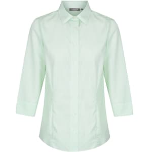 A light green shirt with a collar and three-quarter sleeves, featuring buttons down the front and a logo on the label.