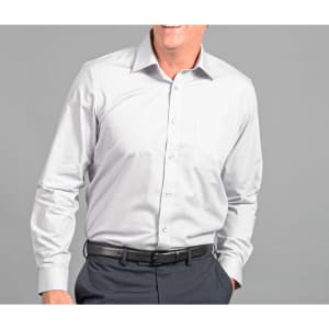 A light grey button-up shirt with a chest pocket, worn by a smiling man against a grey background.