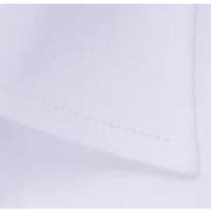 A close-up of a white button-up shirt collar with neat stitching and a branded logo.