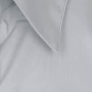 Light blue button-up shirt with a pointed collar, featuring a smooth fabric texture and subtle sheen.