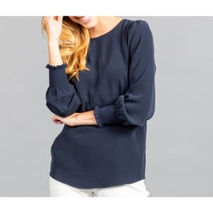 A navy blue long-sleeve top with shirred cuffs and a relaxed fit. Features a round neckline and smooth fabric.